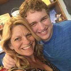Dilip J Karnik, MD - Happy mom and son after working with Dr. Karnik