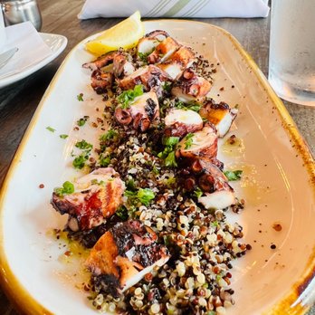 Kid Cashew - Wood-Fire Grilled Spanish Octopus - Tapas/Small Plates Near Me - Sandy Springs, Georgia Kid Cashew - Wood-Fire Grilled Spanish Octopus - Tapas/Small Plates Near Me - Sandy Springs, Georgia