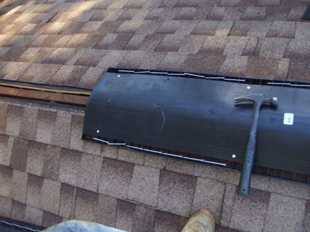 Slide of Ruddy's Roofing