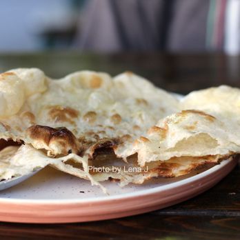 Rupee Bar - Inside of Naan, ghee, sea salt ($4) - Sri Lankan Near Me - Seattle, Washington Rupee Bar - Inside of Naan, ghee, sea salt ($4) - Sri Lankan Near Me - Seattle, Washington
