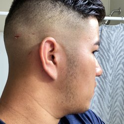 Omar's Barber Shop & Day Spa - Like that is how they cut Show a photo so they knew how I wanted it and they didn't leave it the same