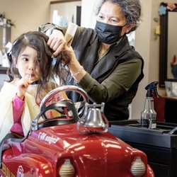 Baby girl 1st haircut.