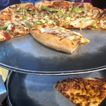 The Red Pepperoni - Pizza being demolished because it's so good! - Pizza Near Me - Madison, Indiana