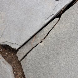 Under Pressure Power Wash LLC - Destroyed the slate walkway. Shards of slate littered the surrounding grass