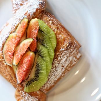 Fior di Latte - a slice of fruit and powdered sugar - Cafes Near Me - Burnaby, British Columbia