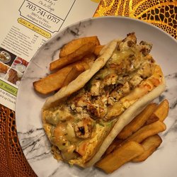 Billy's Deli/Cafe - Chicken Chipotle Pita and some of the fries