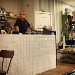 La Boutique del Caffe Torrefazione - The local Italian, overseeing his kingdom Best coffee and croissant around.