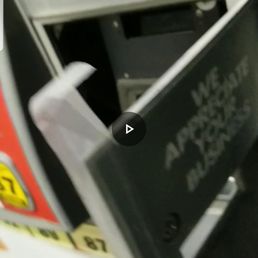 Pump #7 receipt printer door, unlocked and held shut with scotch tape, because "they lost the key"