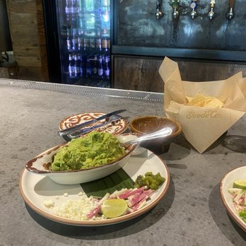 Goode Company Kitchen & Cantina - Handmade Made to Order Guacamole - Large with all the additions except cilantro! - Mexican Near Me - Shenandoah, Texas Goode Company Kitchen & Cantina - Handmade Made to Order Guacamole - Large with all the additions except cilantro! - Mexican Near Me - Shenandoah, Texas