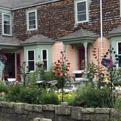 Sea Meadow Gifts & Gardens - Summer gardens full of flowers, garden accents, and hand crafted wind sculptures.
