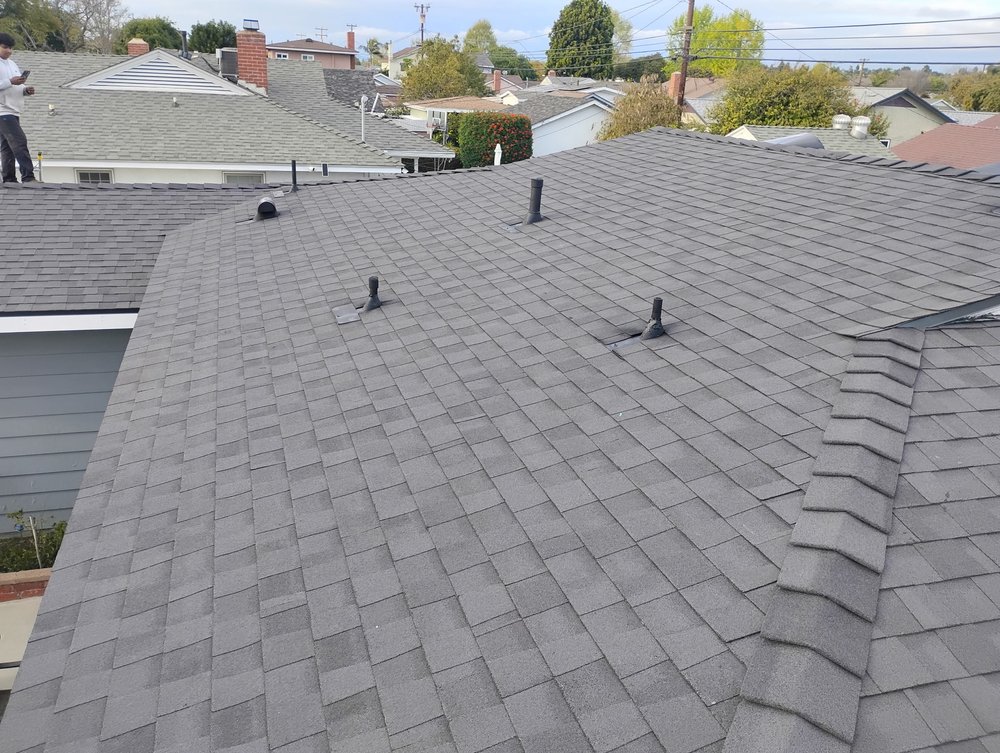 Slide of Sam's Roofing Co