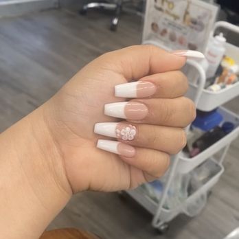 Pro Nails Design - Full acrylic set French design coffin shape with 3D flower design - Nail Salons Near Me - San Jose, California Pro Nails Design - Full acrylic set French design coffin shape with 3D flower design - Nail Salons Near Me - San Jose, California