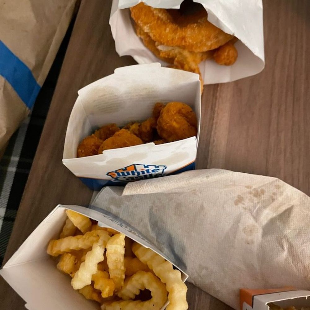 White Castle - three baskets of food on a table - Fast Food Near Me - Berkeley, Missouri White Castle - three baskets of food on a table - Fast Food Near Me - Berkeley, Missouri