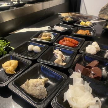 Seapot - Unlimited options from conveyor. Just don't get the fried fish skin. It's stale! - Asian Fusion Near Me - Sacramento, California