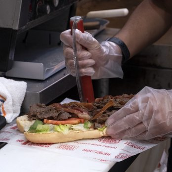 Charleys Cheesesteaks - Working on my large steak sandwich. - Cheesesteaks Near Me - San Diego, California