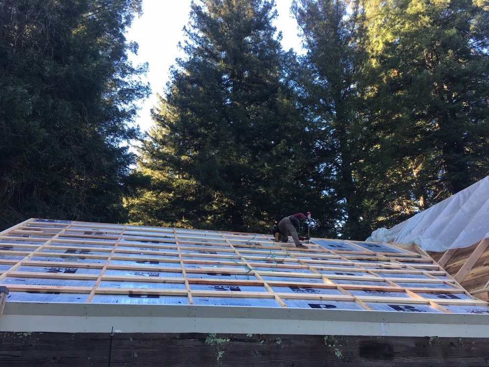 Slide of J E Johnson Roofing