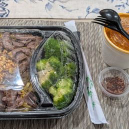 Marinated Steak Strips and a side of steamed broccoli