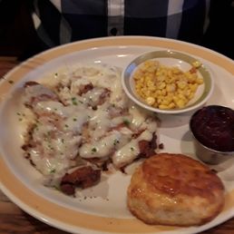 Chicken fried steak and honey drizzled biscuit Chicken fried steak and honey drizzled biscuit