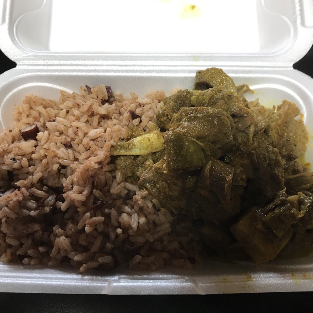 Curry goat with pigeon peas and rice. Delicious! Curry goat with pigeon peas and rice. Delicious!