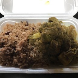 Curry goat with pigeon peas and rice. Delicious! Curry goat with pigeon peas and rice. Delicious!
