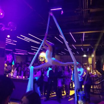 SPIN Chicago - Aerial artist on the bottom level of SPiN - American Near Me - Chicago, Illinois