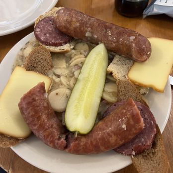 Dutchman's Hidden Valley Country Store - Wurst plate. You can totally share this one. Delicious German potato salad. - Delis Near Me - Hamilton, Texas