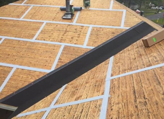 Slide of E R C  Roofing and Construction