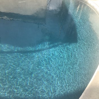 A To Z Pool Plastering - This gloomy weather doesn't due justice to my pic but pool looks beautiful - Pool & Hot Tub Service Near Me