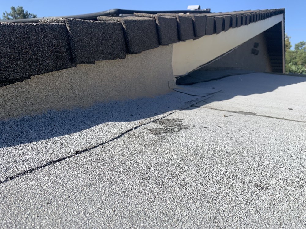 Slide of Ted Guilmette Roofing