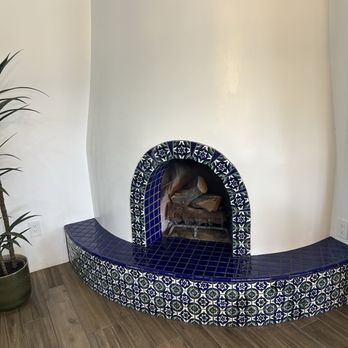 Mason Tile, LLC - He added tile to the hearth to match the existing tile at the opening. - Tiling Near Me Mason Tile, LLC - He added tile to the hearth to match the existing tile at the opening. - Tiling Near Me