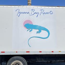 Iguana Bay Resorts - Sign