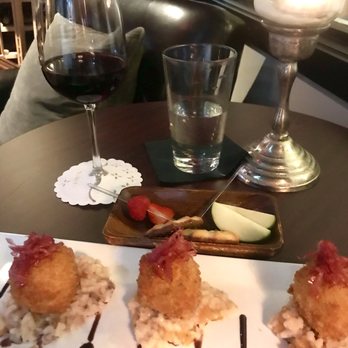 The Artistry Wine Lounge  - Black Ink (red blend) and lamb croquettes over peach risotto. - Wine Bars Near Me - San Pedro, California