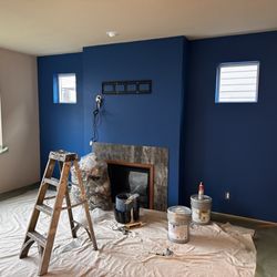 Sparkle Painting - Prepping to paint the living room back to one single color. Blue accent wall that came with the house is gone now