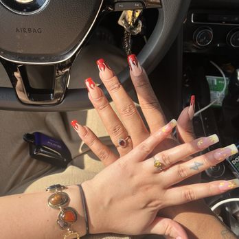 West7 Nail Bar - The set (yellow nails) I had gotten in June, longer shape and a substantial amount of artwork. - Nail Salons Near Me - Fort Worth, Texas West7 Nail Bar - The set (yellow nails) I had gotten in June, longer shape and a substantial amount of artwork. - Nail Salons Near Me - Fort Worth, Texas