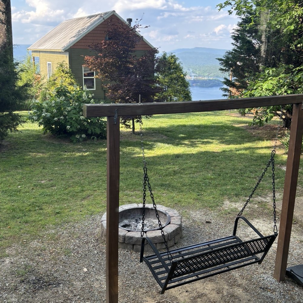Grant Summit Cabins - Swing next to the fire pit in front of our cabin!!! - Resorts Near Me - Bryant, Alabama Grant Summit Cabins - Swing next to the fire pit in front of our cabin!!! - Resorts Near Me - Bryant, Alabama