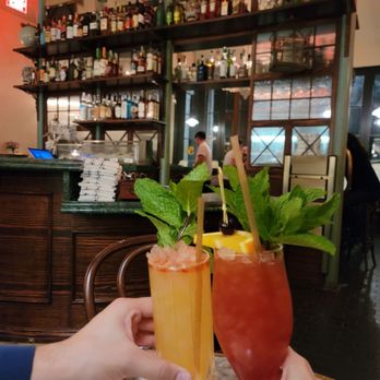 Fives - Saturn in Retrograde (left) Hurricane (right) - Cocktail Bars Near Me - New Orleans, Louisiana