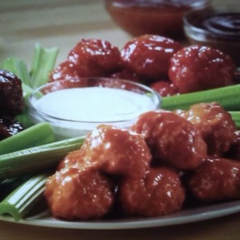 Chuck E. Cheese - Glazed, mild to medium spicy wings, celery and Ranch dressing in the middle.. - Pizza Near Me - Northridge, California