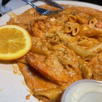 Moriches Bay Diner - a plate of pasta with a lemon slice - Burgers Near Me - Moriches, New York Moriches Bay Diner - a plate of pasta with a lemon slice - Burgers Near Me - Moriches, New York