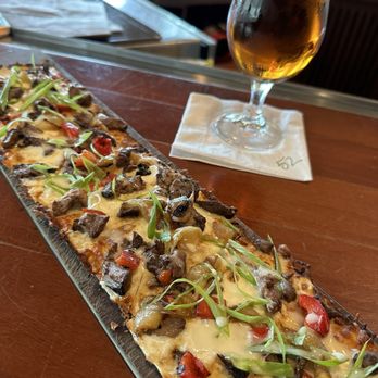 Seasons 52 - Philly Cheesesteak flatbread - New American Near Me - North Bethesda, Maryland Seasons 52 - Philly Cheesesteak flatbread - New American Near Me - North Bethesda, Maryland