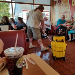 KFC - Here is a customer cleaning up a dining room spill because none of the employees would...