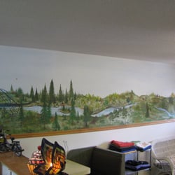The Main Scoop - A great mural depicts the Chippewa River and the Old Abe Trail from Cornell to Jim Falls.