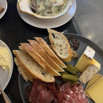 The Rind - Raclette potatoes and a cheese and charcuterie - Wine Bars Near Me - Berkley, Michigan The Rind - Raclette potatoes and a cheese and charcuterie - Wine Bars Near Me - Berkley, Michigan