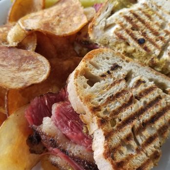 Power City Eatery - Pastrami Melt with a pickle and chips. - Coffee & Tea Near Me - Niagara Falls, New York Power City Eatery - Pastrami Melt with a pickle and chips. - Coffee & Tea Near Me - Niagara Falls, New York