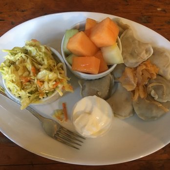 Future Bistro - Jalapeño cheese pierogie with coleslaw and fruit salads as sides - Breakfast & Brunch Near Me - Toronto, Ontario Future Bistro - Jalapeño cheese pierogie with coleslaw and fruit salads as sides - Breakfast & Brunch Near Me - Toronto, Ontario