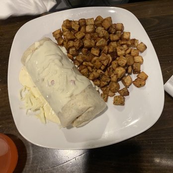 Eggs & Jam - Yo Homes to Bel Air burrito with queso - Breakfast & Brunch Near Me - West Des Moines, Iowa