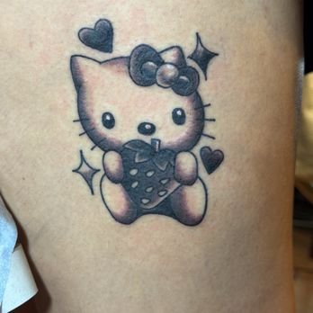 Black Gold Tattoo - hello kitty by ezra - Tattoo Near Me - Sacramento, California Black Gold Tattoo - hello kitty by ezra - Tattoo Near Me - Sacramento, California