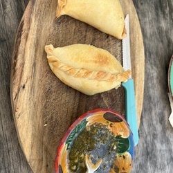 Dulzura Argenta - Spinach and carne empanada. Chinichurri sauce.