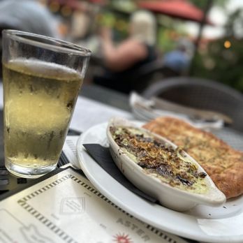 Aster Cafe - a plate of food and a glass of beer - New American Near Me - Minneapolis, Minnesota
