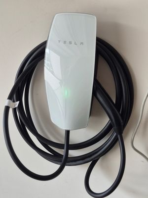 Tesla EV Charging Station - We installed a 60 amp dedicated circuit for a Tesla EV Charging Station at a Tracy, CA residence. Tesla EV Charging Station - We installed a 60 amp dedicated circuit for a Tesla EV Charging Station at a Tracy, CA residence.