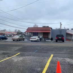 a parking lot with a cone in the foreground a parking lot with a cone in the foreground